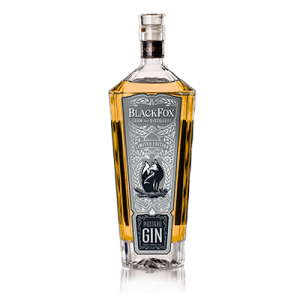 Mustard Gin Bottle filled with yellow spirit, crafted by Black Fox Farm and Distillery
